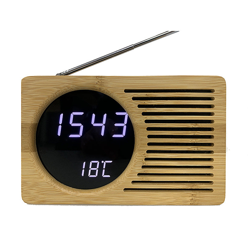 Digitaalinen radioherätyskello lämpötilanäytöllä 0
