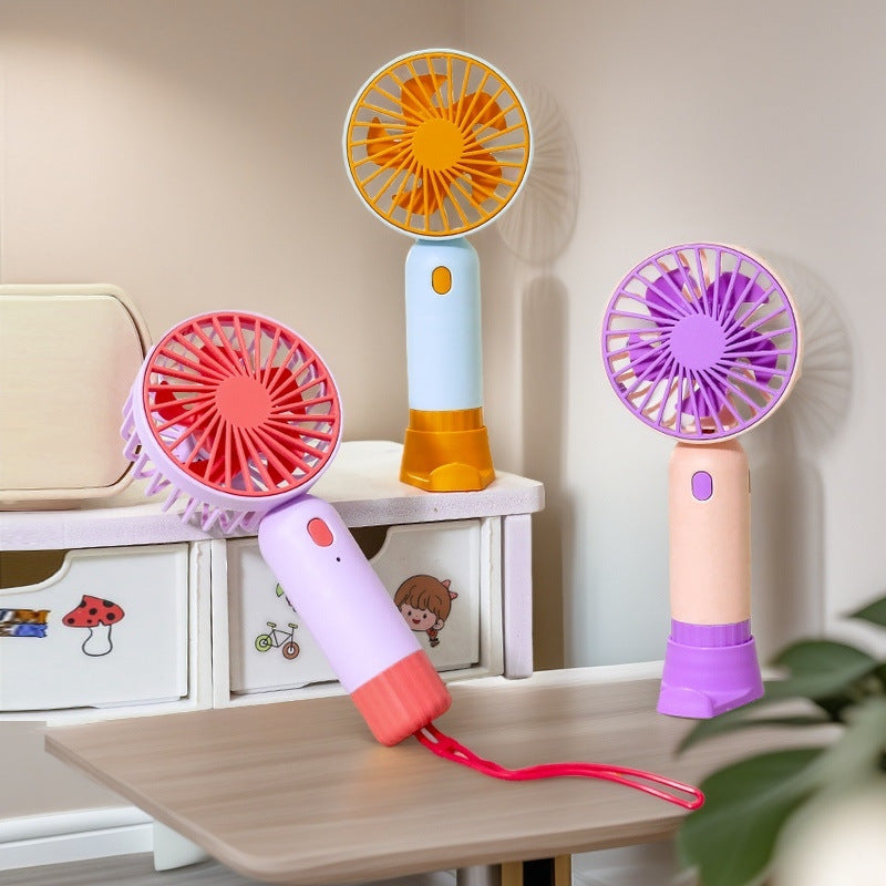 Naisten Kannettava Minituuletin Ergonomisella Kahvalla 1
