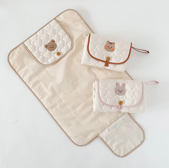 Infant kokoontaitettava vaipanvaihtolaite
