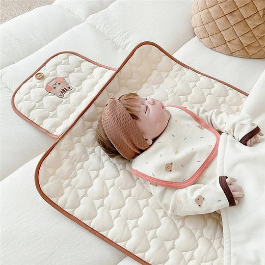 Infant kokoontaitettava vaipanvaihtolaite