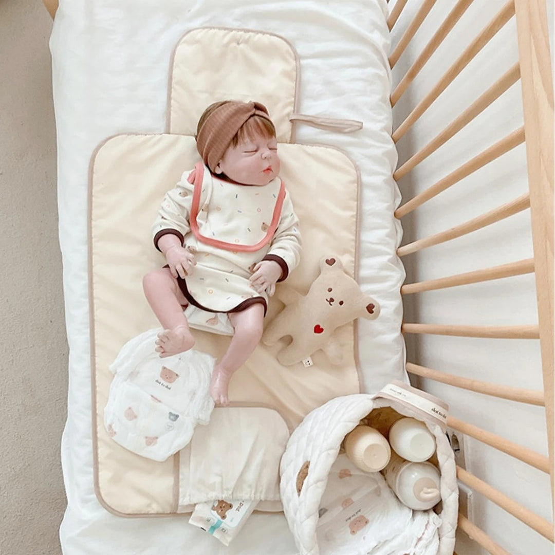 Infant kokoontaitettava vaipanvaihtolaite