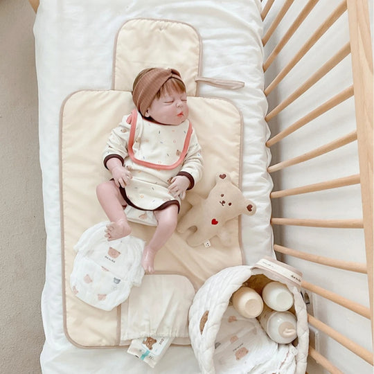 Infant kokoontaitettava vaipanvaihtolaite
